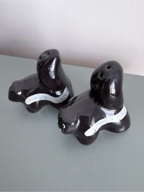 Vintage MCM Skunk salt and pepper shakers